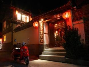 Отель Lijiang Overseas Club Экстерьер фото