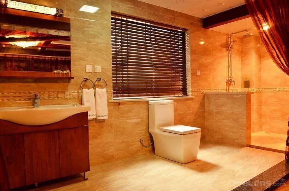 Отель Lijiang Overseas Club Экстерьер фото