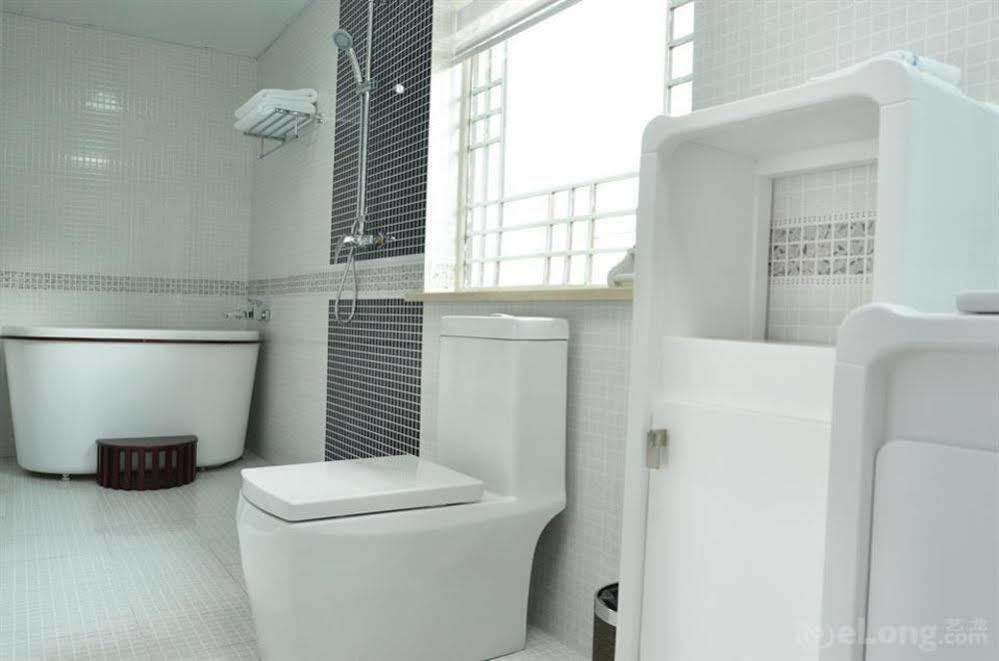 Отель Lijiang Overseas Club Экстерьер фото