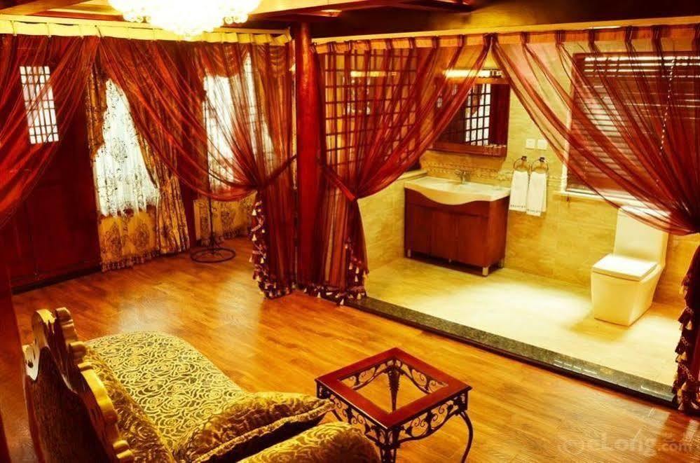 Отель Lijiang Overseas Club Экстерьер фото