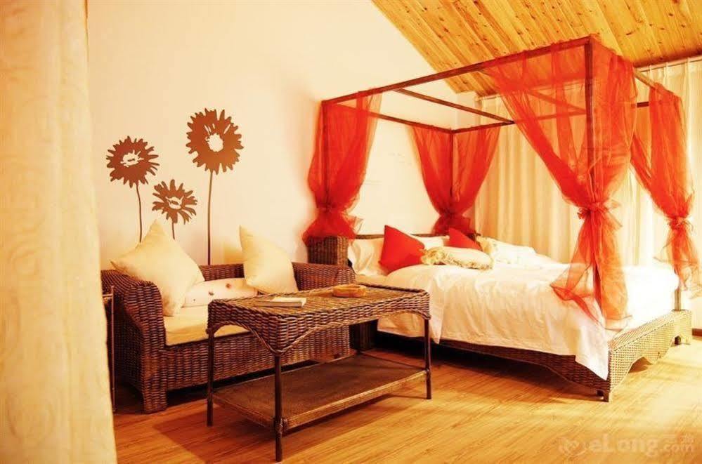 Отель Lijiang Overseas Club Экстерьер фото