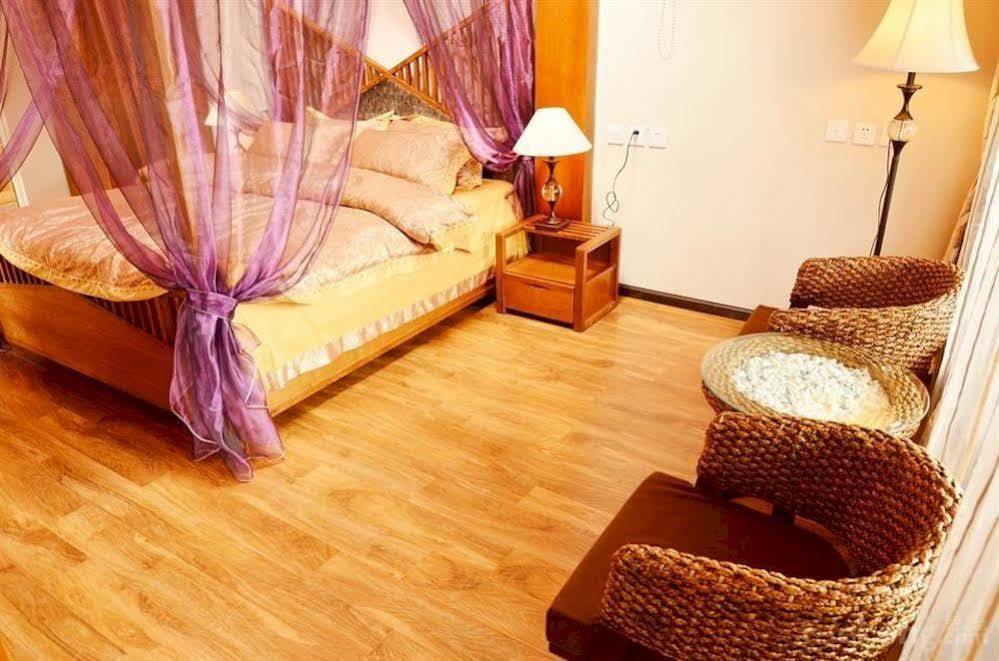 Отель Lijiang Overseas Club Экстерьер фото