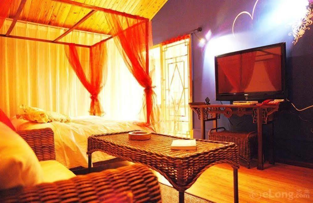 Отель Lijiang Overseas Club Экстерьер фото
